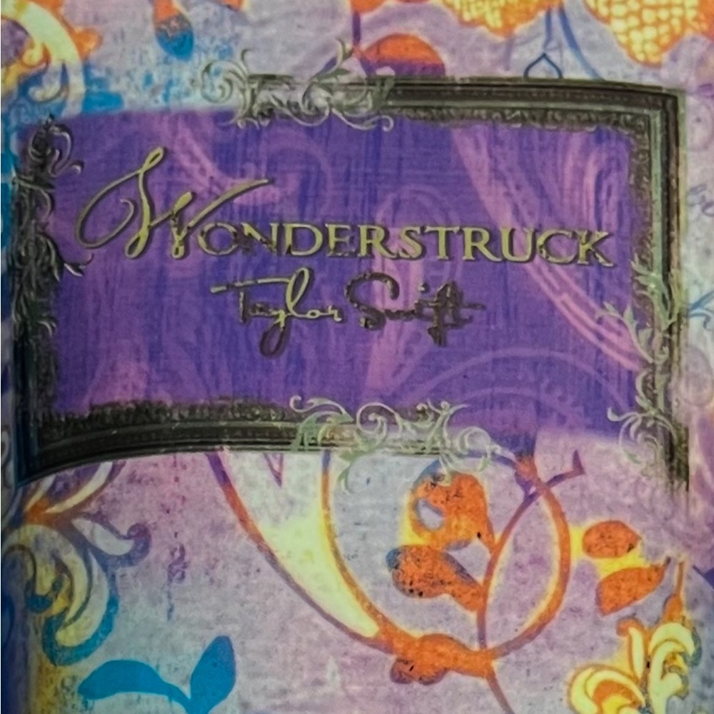 Taylor Swift Wonderstruck lotion 6.8 oz purple bottle